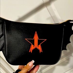 Jeffree Star Black and Orange makeup bag